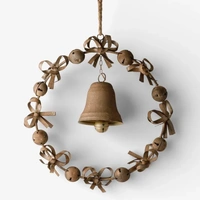 Bow and Bell Rust Metal Wreath